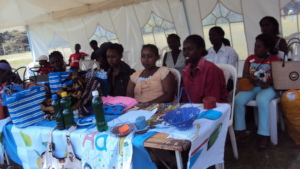 A group of teen mums with weaved bags
