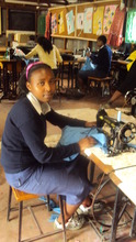 Joyce in a tailoring class