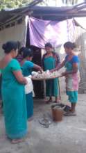 Women mushroom growers independently working