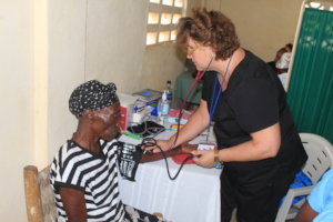Nurse Deborah taking vital signs.