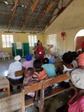Nurse Christine running an educational conference