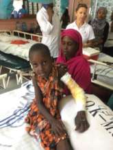 Young snakebite patient, Giney, in recovery