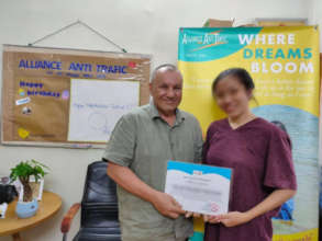 Petunia received certificate at AAT office