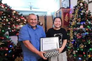 Uyen received her certificate from our director