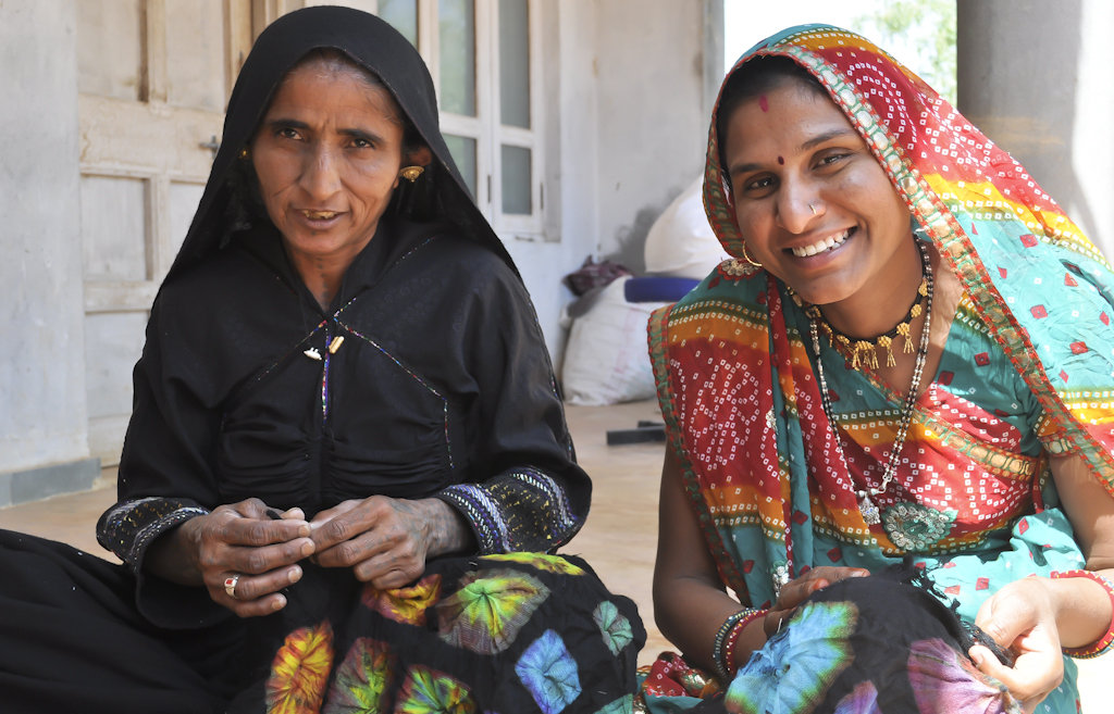 Hansuben and Chandrika work together on a project