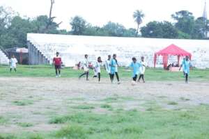 The girls playing the football match