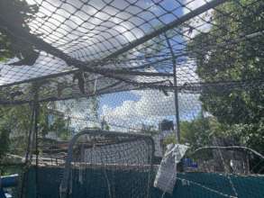 Corroding metal framework holding up the netting