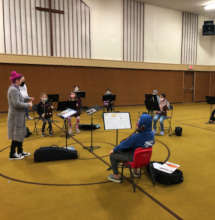 Intermediate orchestra meets in a hybrid rehearsal