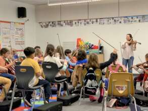 Anna Lee visits the JOY After School Orchestra