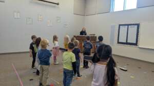Kinder class works with box violins