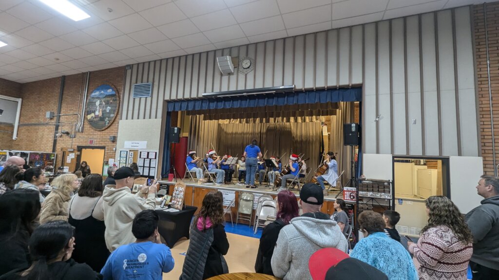 Students play at Holiday Craft Bazaar