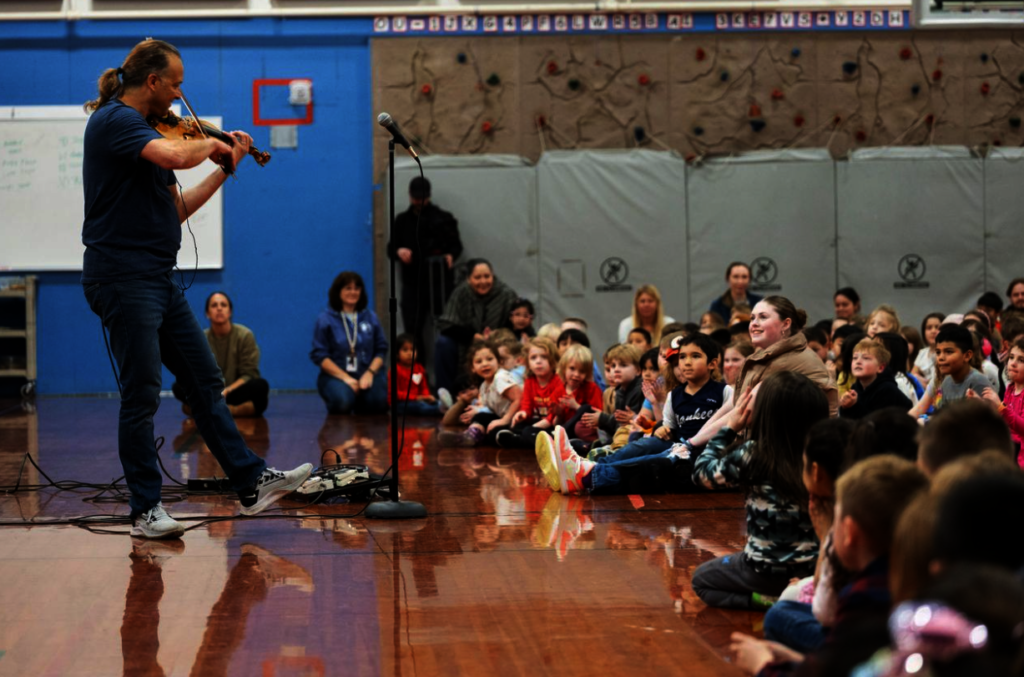 Aaron Meyer performs a school wide assembly