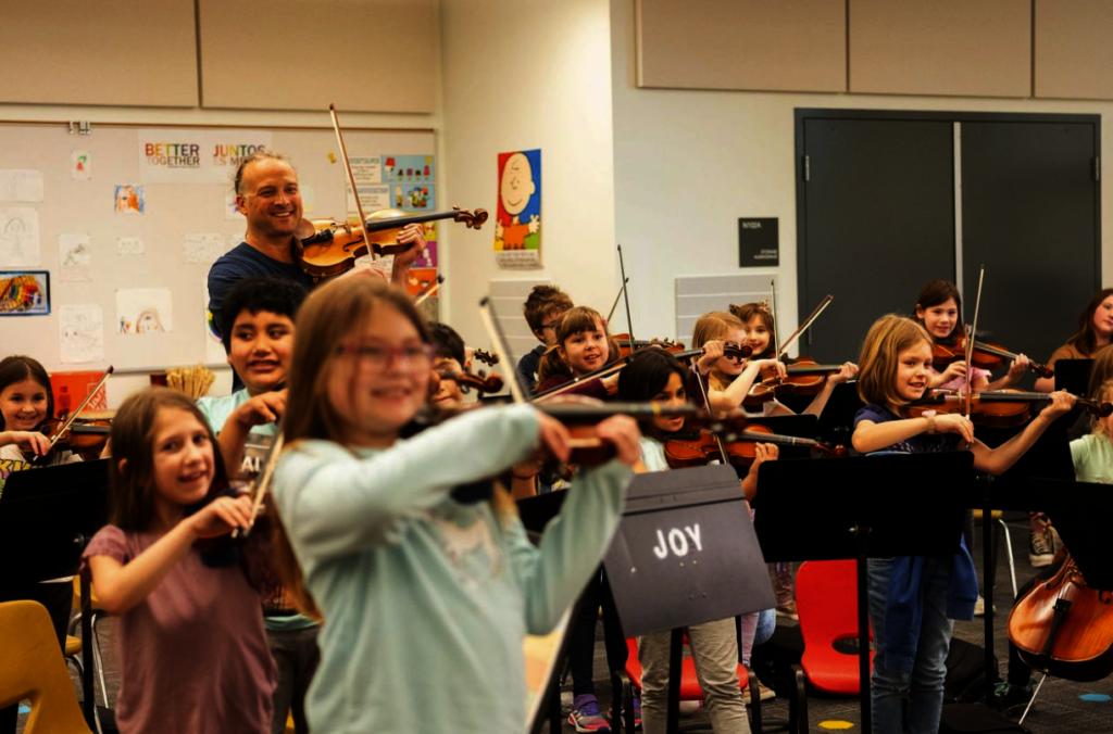Aaron Meyer works with the JOY Concert Orchestra