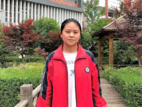 Zhengqiong at her high school in Zhaotong