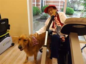 Resident with Gates, the Cedar Village dog