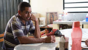 Migrant receiving legal aid by Asylum Access