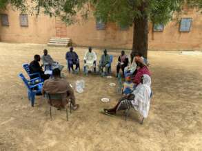 Kara meets with parents of scholarship recipients