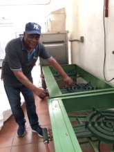 Jacques, our Haitian chef, with the new stovetop