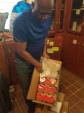 Jacques, our chef, receiving shipped-in supplies