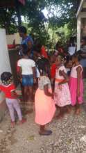 Children waiting for Chili Kabrit meals (Dec)