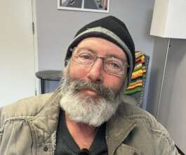Kentucky resident wearing his new New Eyes glasses
