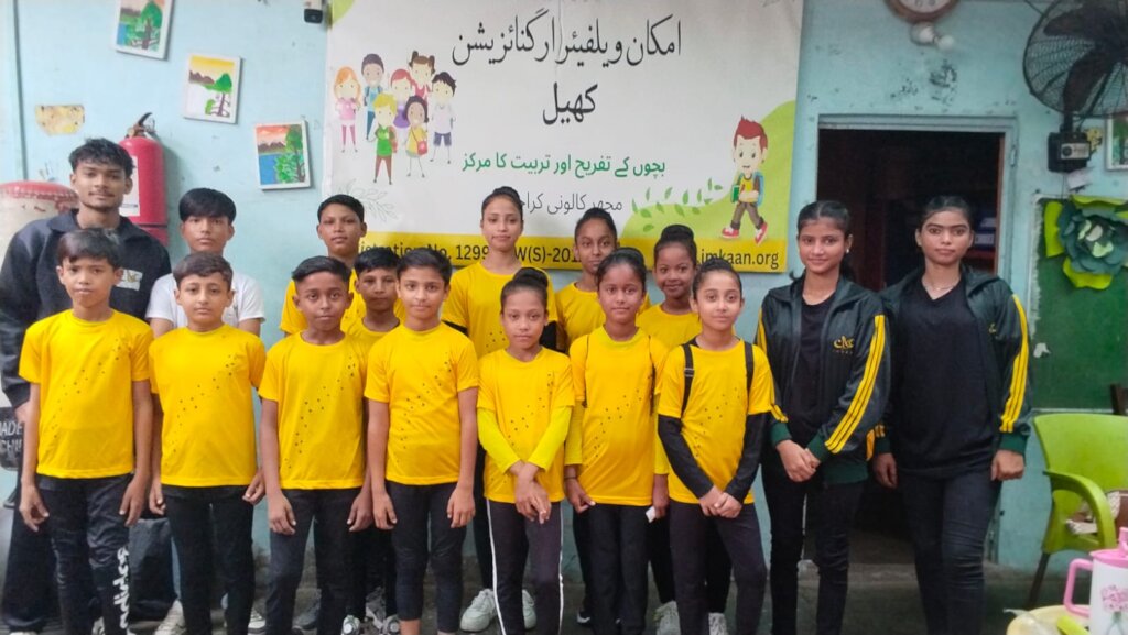 The new gymnasts with their coaches