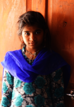 Pooja outside her home in Barwani