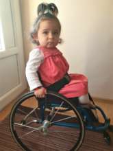 Irinuca in her new wheelchair