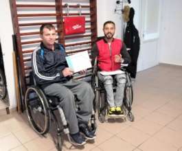 Costel with his independent living trainer, Marian