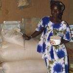 Small farmer with grain in a food bank