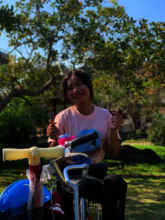 Chhim and her bike