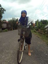 Nita rides her bike to school!