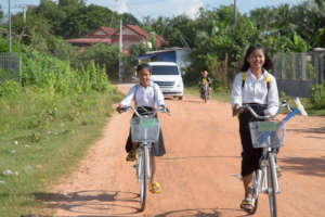 Sreykat and Vattey riding their new bikes!