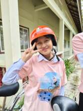 Theara with her bicycle