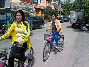 Mealea (left) on her Lotus Pedals bike