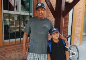 Our graduate, who remained in-country, and his son