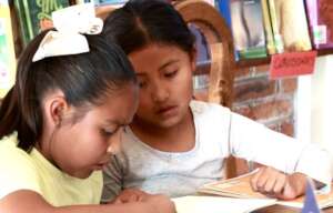Little girls learning to read