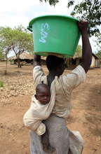 Mother & baby on daily water duty