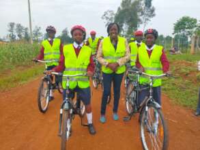 Ms. Mukanda, students and new Buffalo Bicycles!