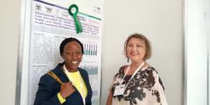 Dr Elizabeth Namukwaya at EAPC with Dr Mhoira Leng