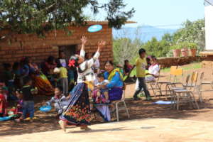 Wixaritari student play with frisbee