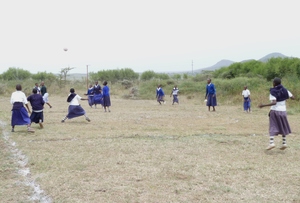Older students enjoy a game of netball