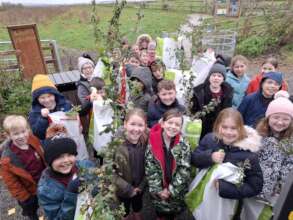 Bringing trees to gift to the community