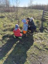 Our youngest volunteers look after the fruit trees
