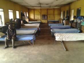 Neatly made beds and hostels