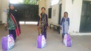 Students with their grocery bags