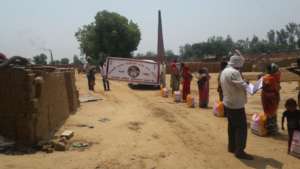 Villagers with their groceries