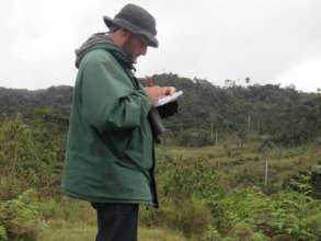 Forest guard Carlos Mario monitoring the parrots