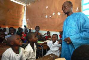 Children attending a new school in their village