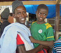 Mamady with his rescued nephew